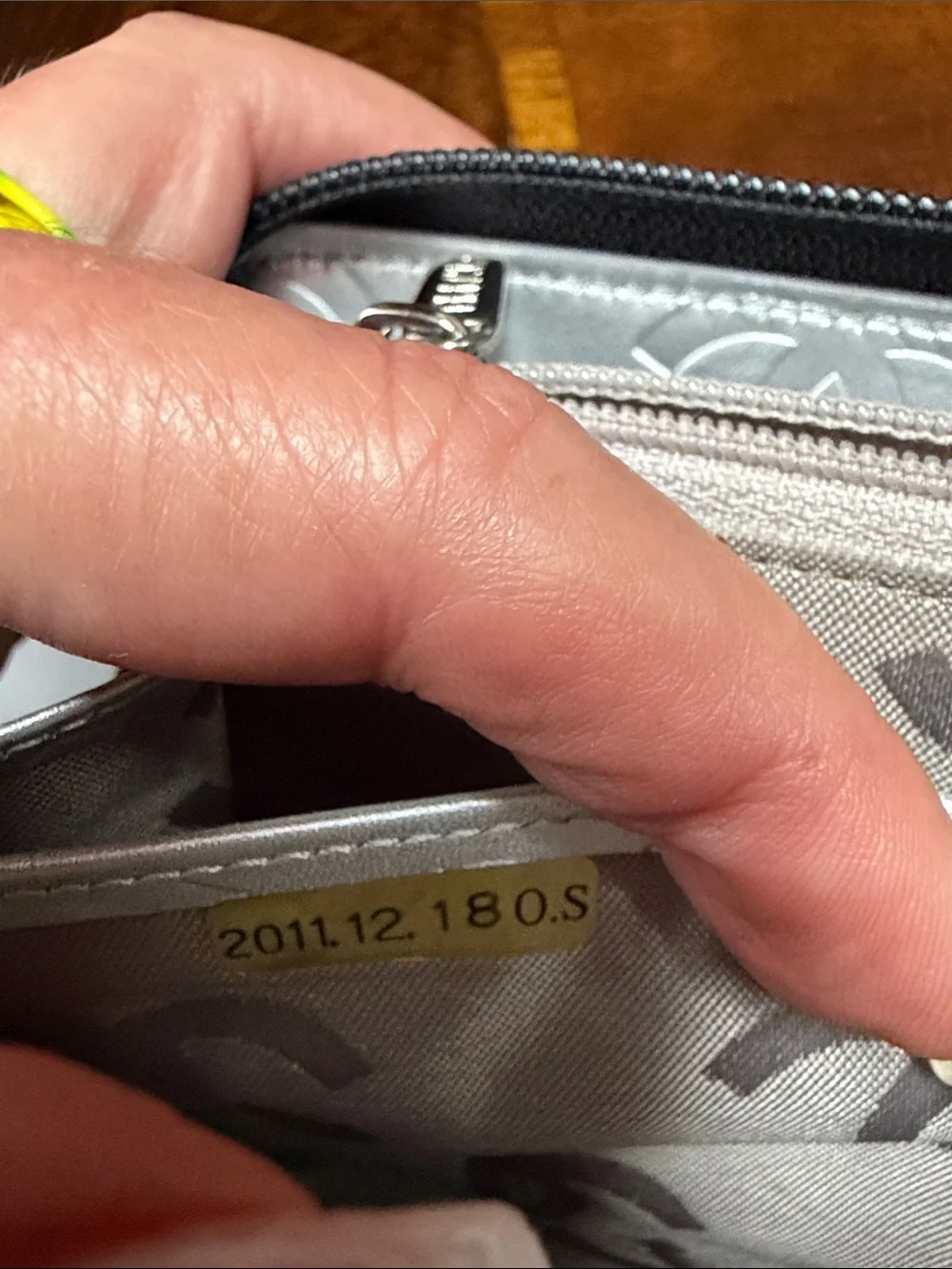 CHANEL Black Quilted Zip Wallet with Silver CC Patch